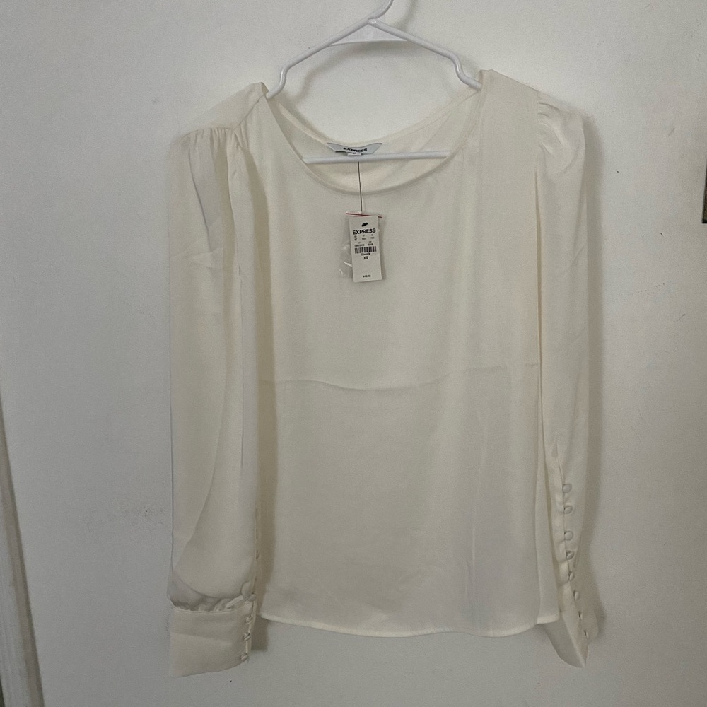 New* EXPRESS ivory long sleeve blouse. Small puff shoulders & button sleeves